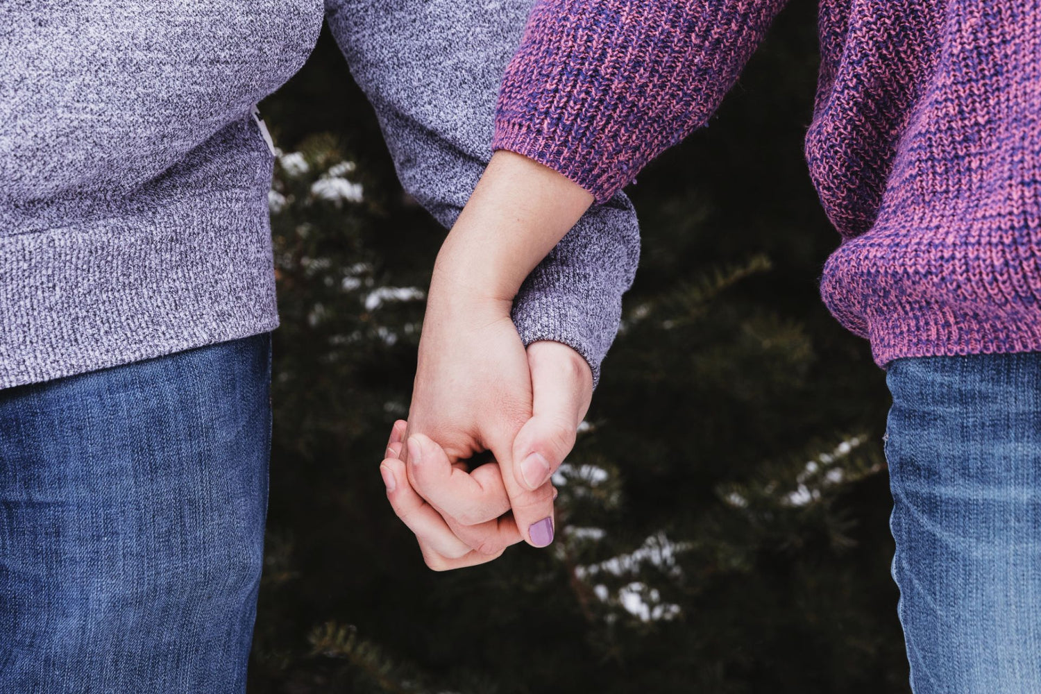 close up of holding hands